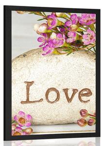 Αφίσα με επιγραφή σε πέτρα Love