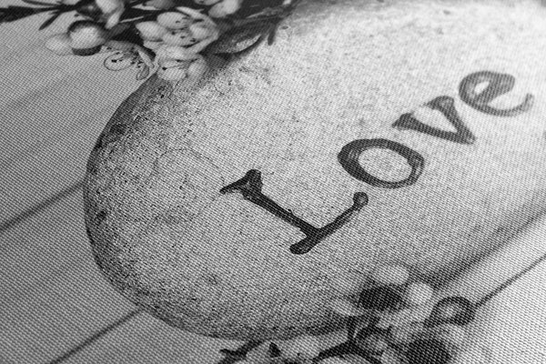 Πίνακας σε καμβά με επιγραφή Love σε πέτρα σε ασπρόμαυρη εκδοχή