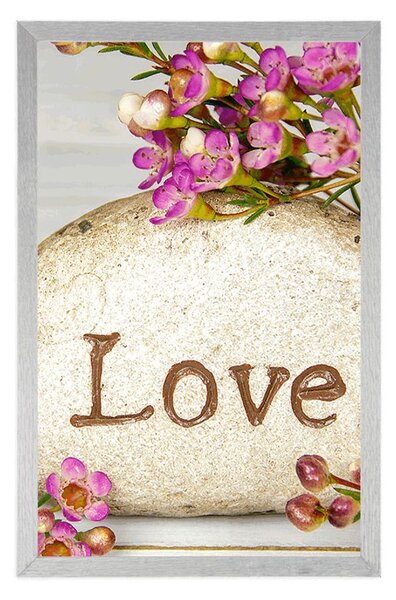Αφίσα με επιγραφή σε πέτρα Love