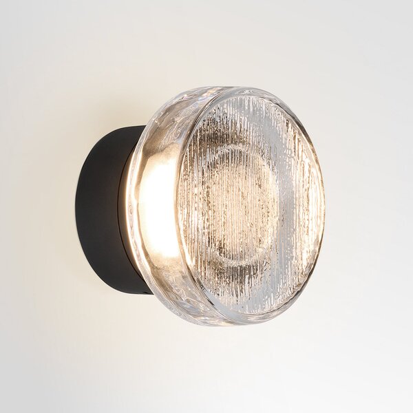 MARSET LED εξωτερική λάμπα τοίχου Roc, Ø 14 cm, μαύρη/ημιδιαφανής, ρυθμιζόμενος, Μαύρο, Αλουμίνιο, σχεδιασμός