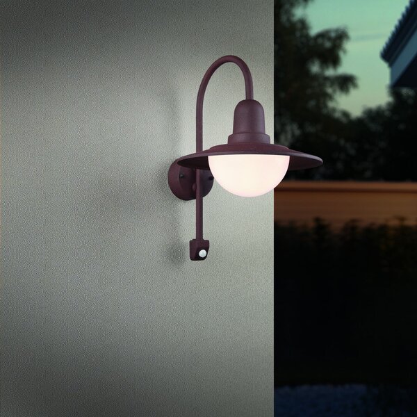 Trio Lighting Εξωτερική λάμπα με αισθητήρα NORMAN, σκουριά, Ø 30 cm Μέταλλο/γυαλί IP44, ρυθμιζόμενος, Καφέ / Σκουριάς, Αλουμίνιο, Στρογγυλό τοίχο