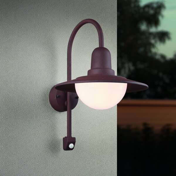 Trio Lighting Εξωτερική λάμπα με αισθητήρα NORMAN, σκουριά, Ø 30 cm Μέταλλο/γυαλί IP44, ρυθμιζόμενος, Καφέ / Σκουριάς, Αλουμίνιο, Στρογγυλό τοίχο
