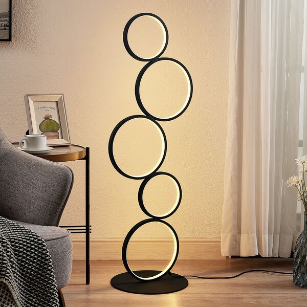 Lindby LED φωτιστικό δαπέδου Jacek, μαύρο, μέταλλο, 110 cm, δαχτυλίδια, Μαύρο, Σαλόνι / τραπεζαρία, Μέταλλο, σύγχρονο