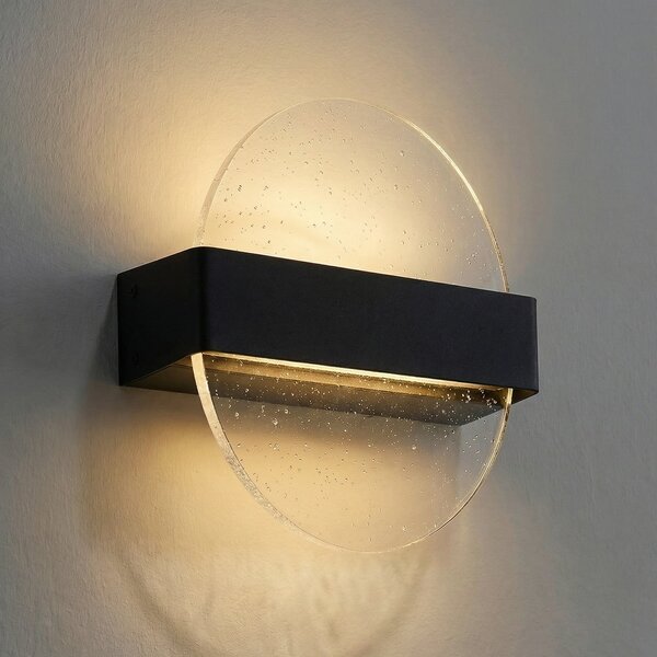 Lucande Φωτιστικό τοίχου LED Narkelo, μαύρο/διαφανές, CCT, IP44, ρυθμιζόμενος, Διαφανές, Γυαλί, σχεδιασμός