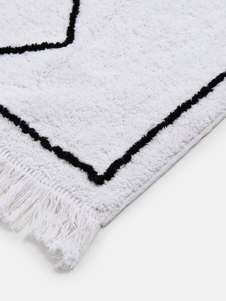 Sinsay - Tufted χαλί με γεωμετρικό σχέδιο και κρόσσια - κρεμ