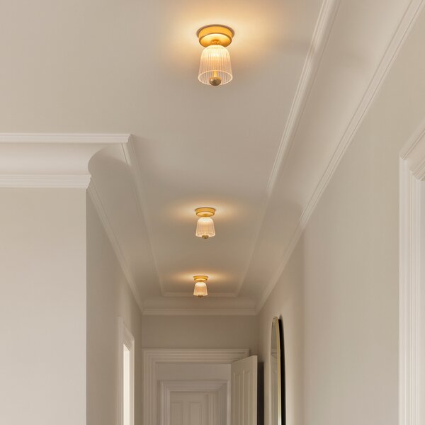Nuura Aps LED φωτιστικό οροφής Asteea, Ø 12 cm, χρώμα ορείχαλκου/διαφανές, ρυθμιζόμενος, Χρυσό / Ορείχαλκου, Σαλόνι / τραπεζαρία, Μέταλλο, Σκανδιναβικό